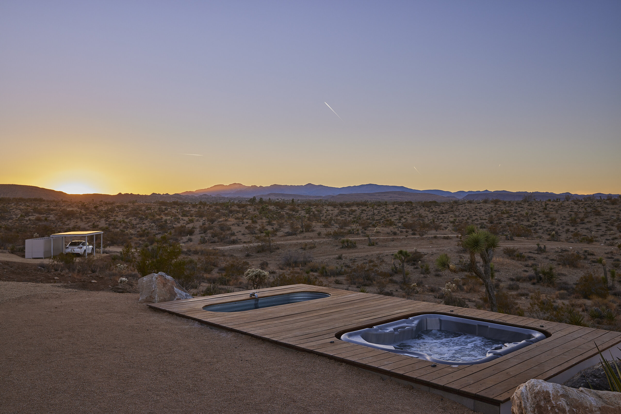 Pause House AM deck and tubs at sunset