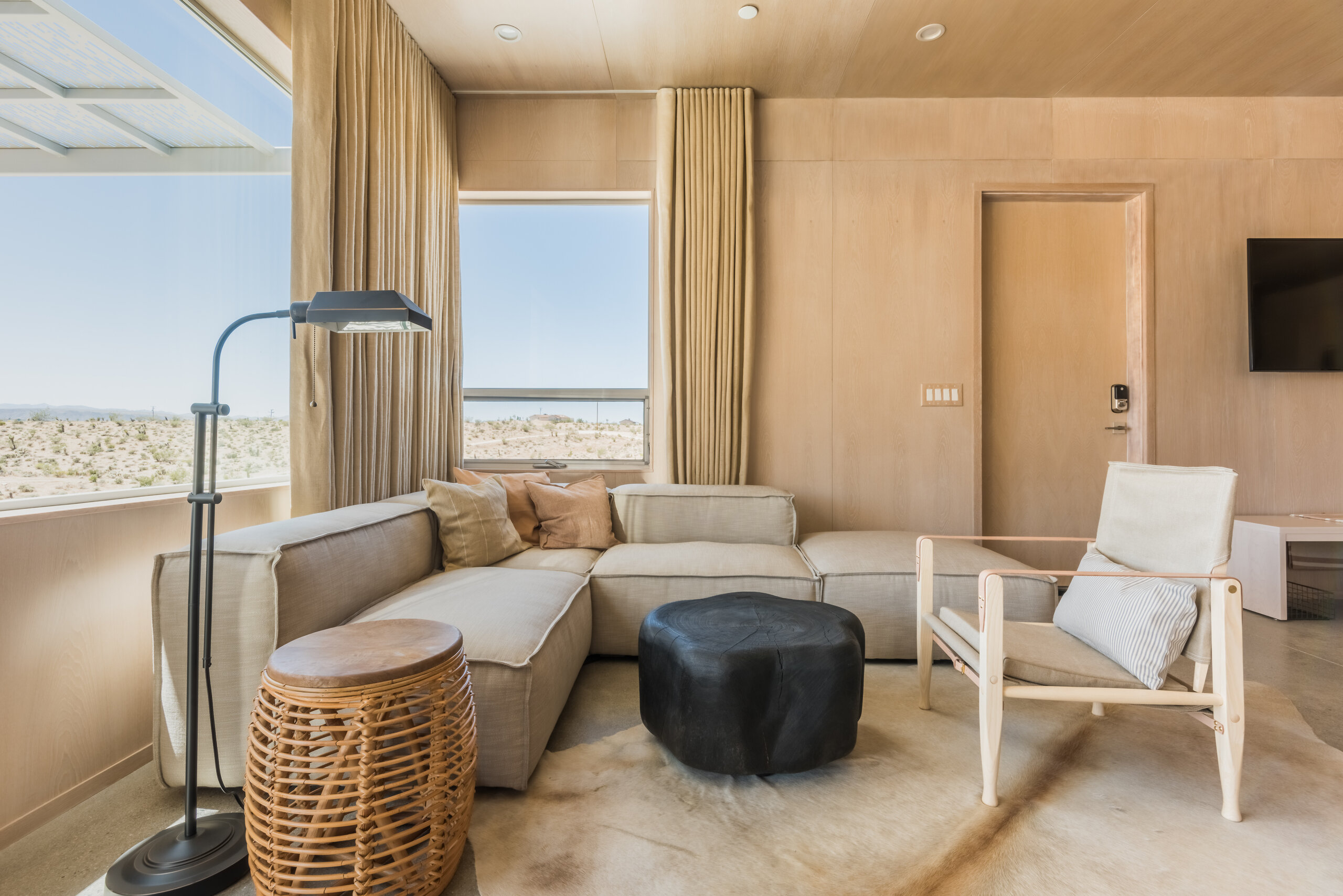Living area at Pause House AM with a view over Yucca Valley